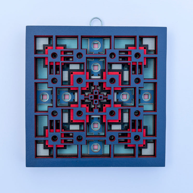 Noughts and crosses. An original multi layered mandala artwork designed using geometric and symmetrical patterns. Unique statement wall décor.
