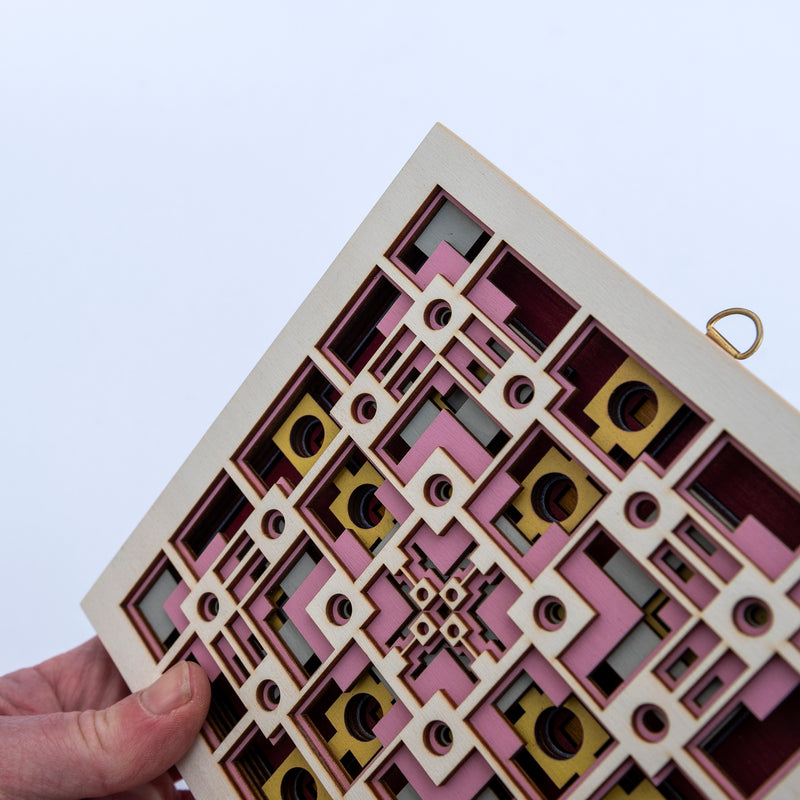 Noughts and crosses. An original multi layered mandala artwork designed using geometric and symmetrical patterns. Unique statement wall décor.