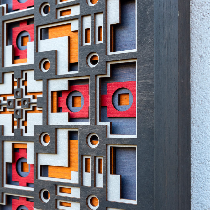 Noughts and crosses. A layered plywood artwork designed using geometric and symmetrical patterns. visually balanced wall art.