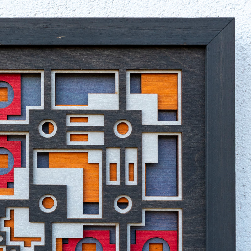 Noughts and crosses. A layered plywood artwork designed using geometric and symmetrical patterns. visually balanced wall art.