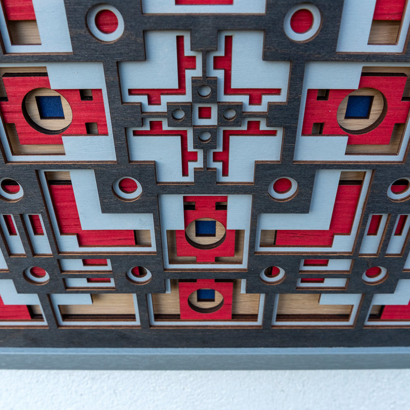 Noughts and crosses. A layered plywood artwork designed using geometric and symmetrical patterns. visually balanced wall art.