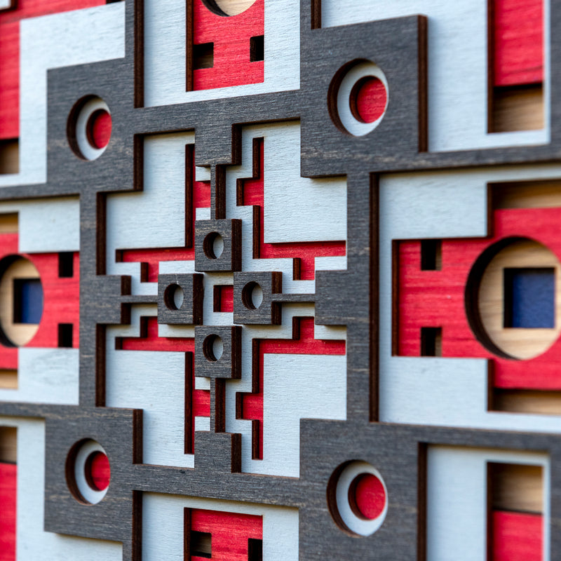 Noughts and crosses. A layered plywood artwork designed using geometric and symmetrical patterns. visually balanced wall art.