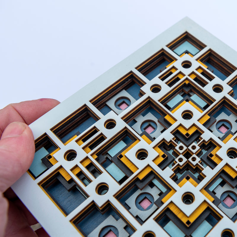 Noughts and crosses. An original multi layered mandala artwork designed using geometric and symmetrical patterns. Unique statement wall décor.