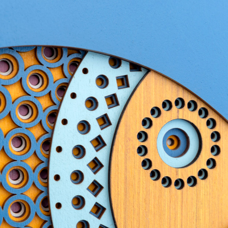 An original Fish themed multi layered artwork designed using geometric patterns. Beautiful, quirky unique wall décor.