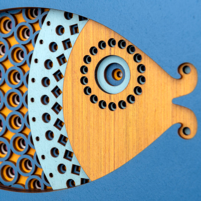 An original Fish themed multi layered artwork designed using geometric patterns. Beautiful, quirky unique wall décor.