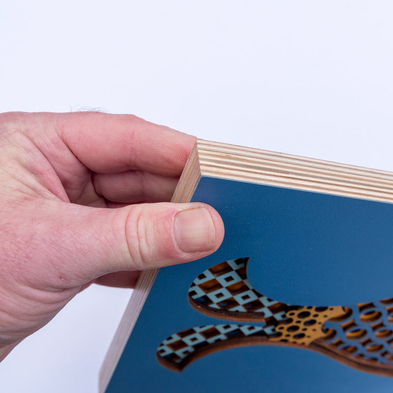 An original Fish themed multi layered artwork designed using geometric patterns. Beautiful, quirky unique wall décor.