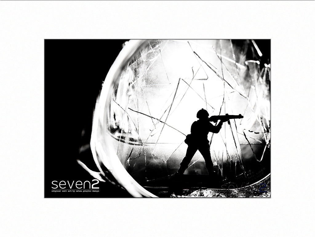 Black and white image of Plastic toy soldier with light and broken glass