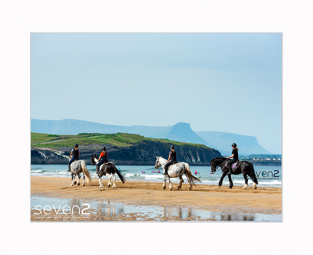 Horses on tullan strand with Dartry mountains backdrop. Bundoran co.Donegal Ireland. wild atlantic way