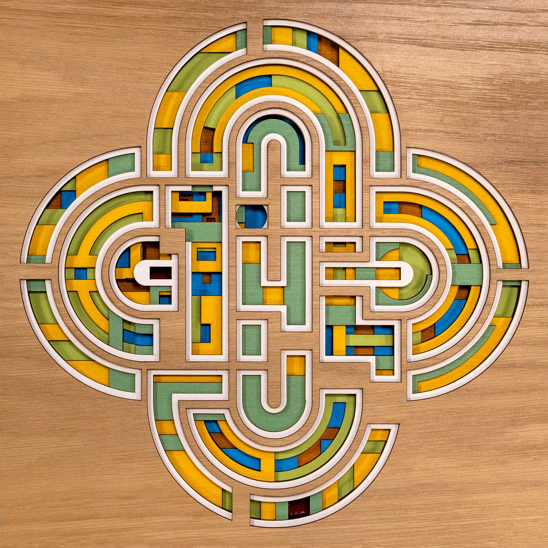 Irish Celtic knot wall art, modern Irish art,  layered wooden geometric maze design, handcrafted from 8 wood layers with heritage inspired green, yellow, and blue hues and colouring.
