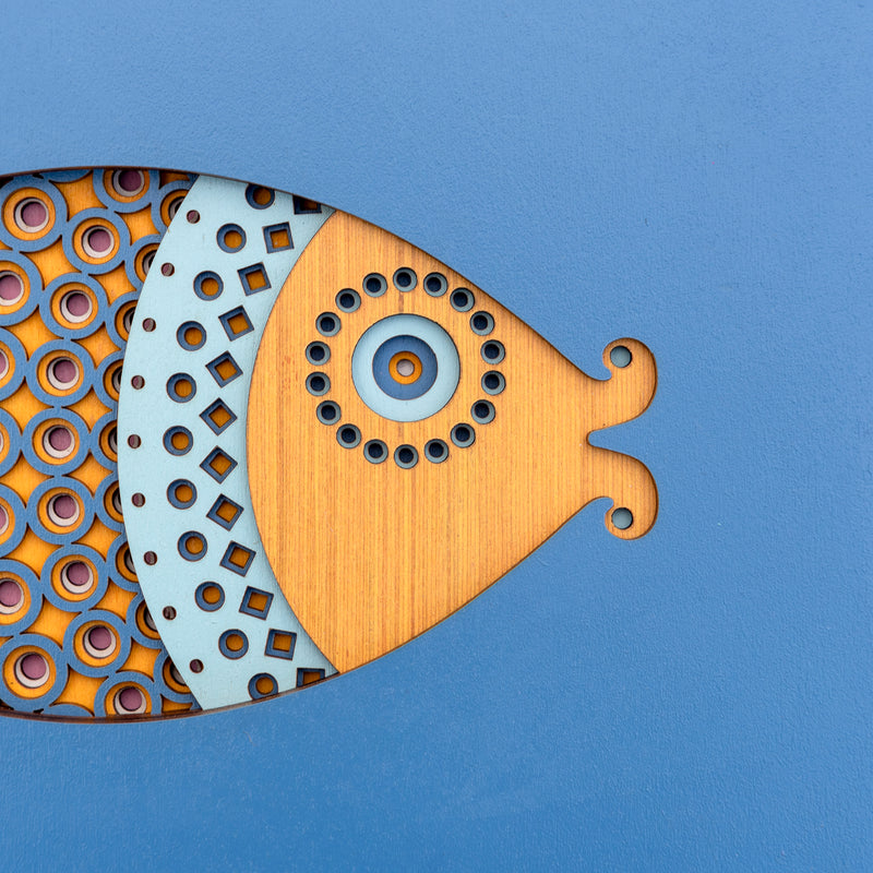 An original Fish themed multi layered artwork designed using geometric patterns. Beautiful, quirky unique wall décor.